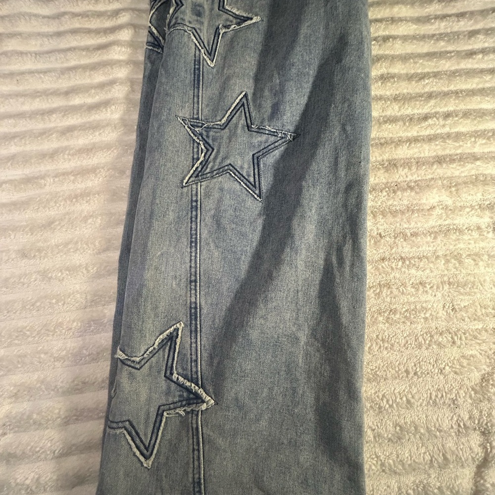 Stylish Light Blue Jeans with Star Accents
